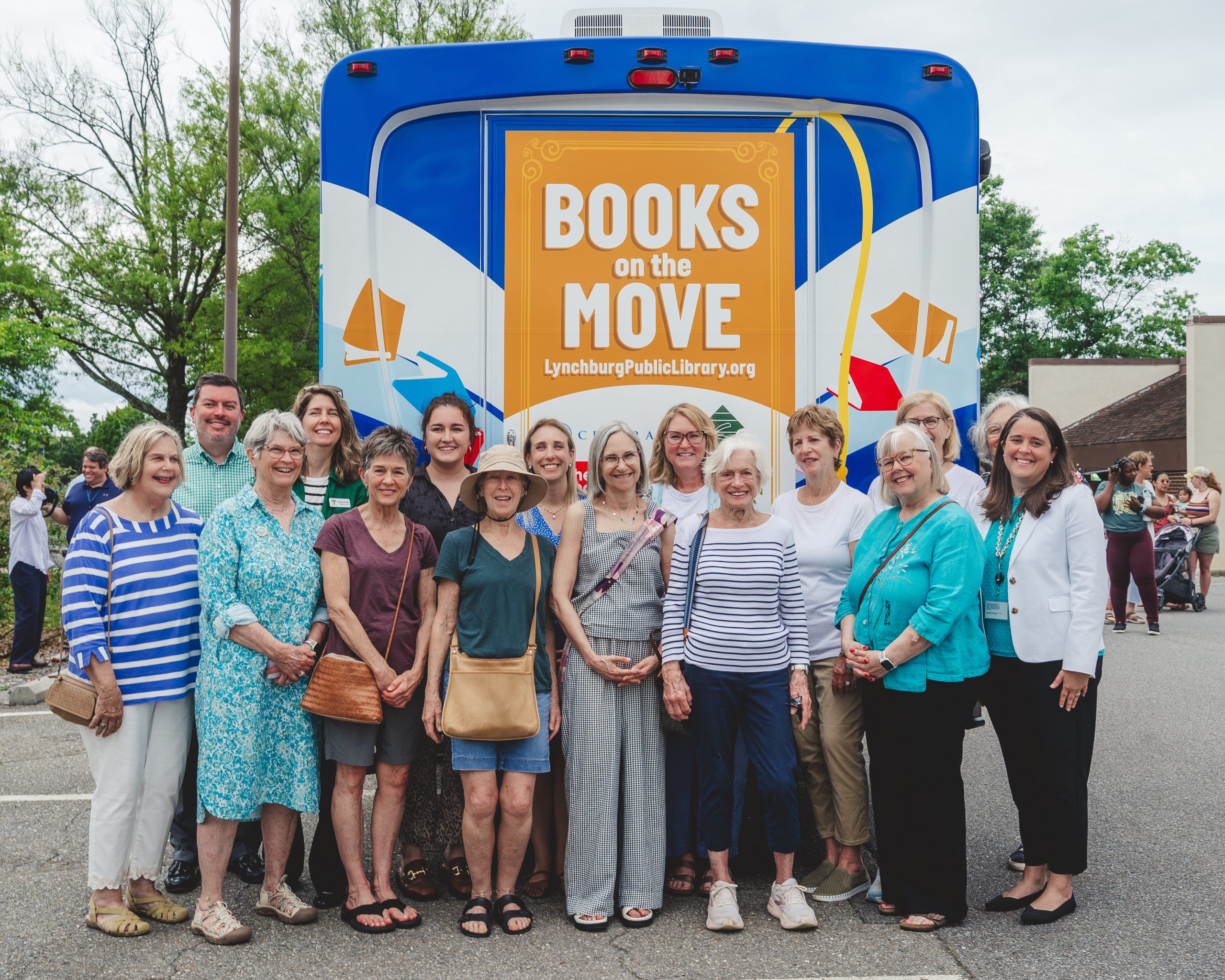 The Friends of the Lynchburg Public Library pose with the new bookmobile.